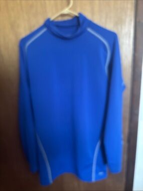 Nike Men's Blue Turtleneck Athletic Top with Contrast Stitching